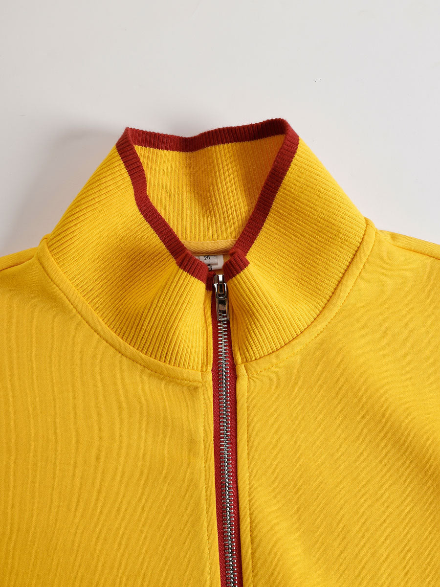 Sudadera amarilla de media cremallera con cuello elástico y acabado granate