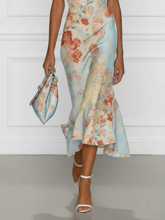 Vestido sirena midi sin mangas con escote drapeado y volante, estampado floral azul claro