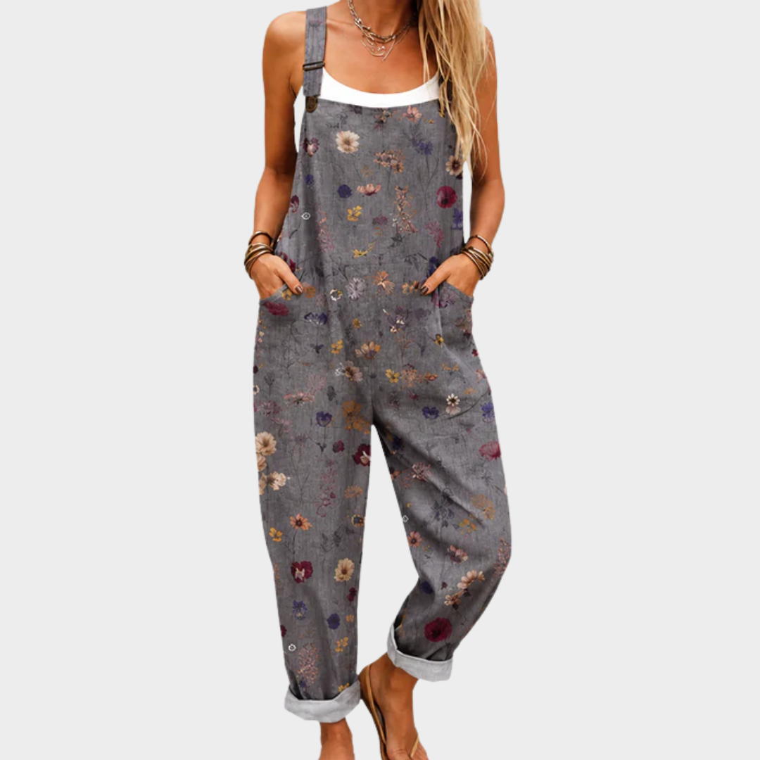Peto largo para mujer de tela gris oscuro con flores multicolor y tirantes ajustables