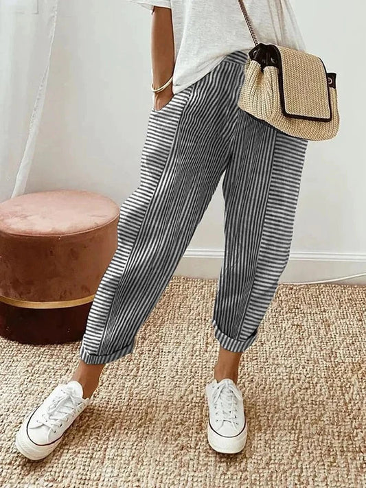 Pantalones de corte ancho con rayas verticales grises, cintura elástica