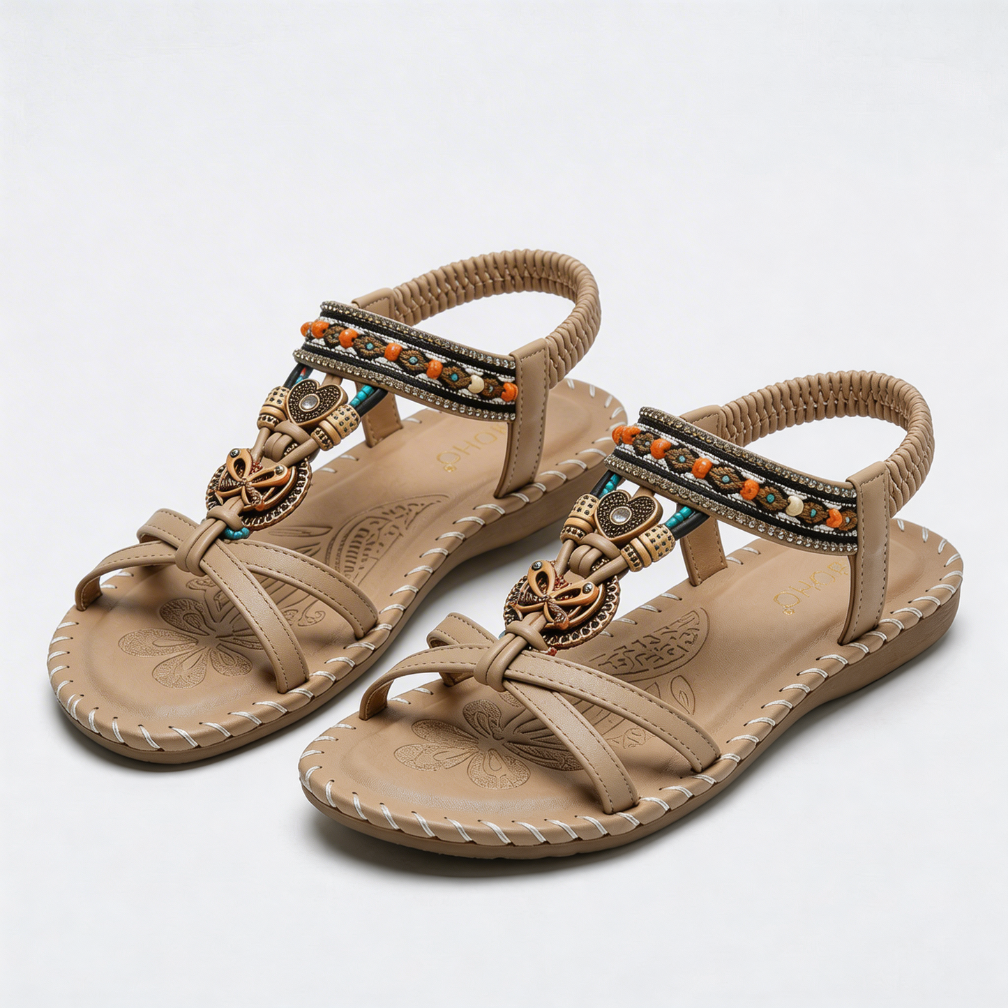 Sandalias ortopédicas beige con hebilla trenzada en el empeine y adorno boho