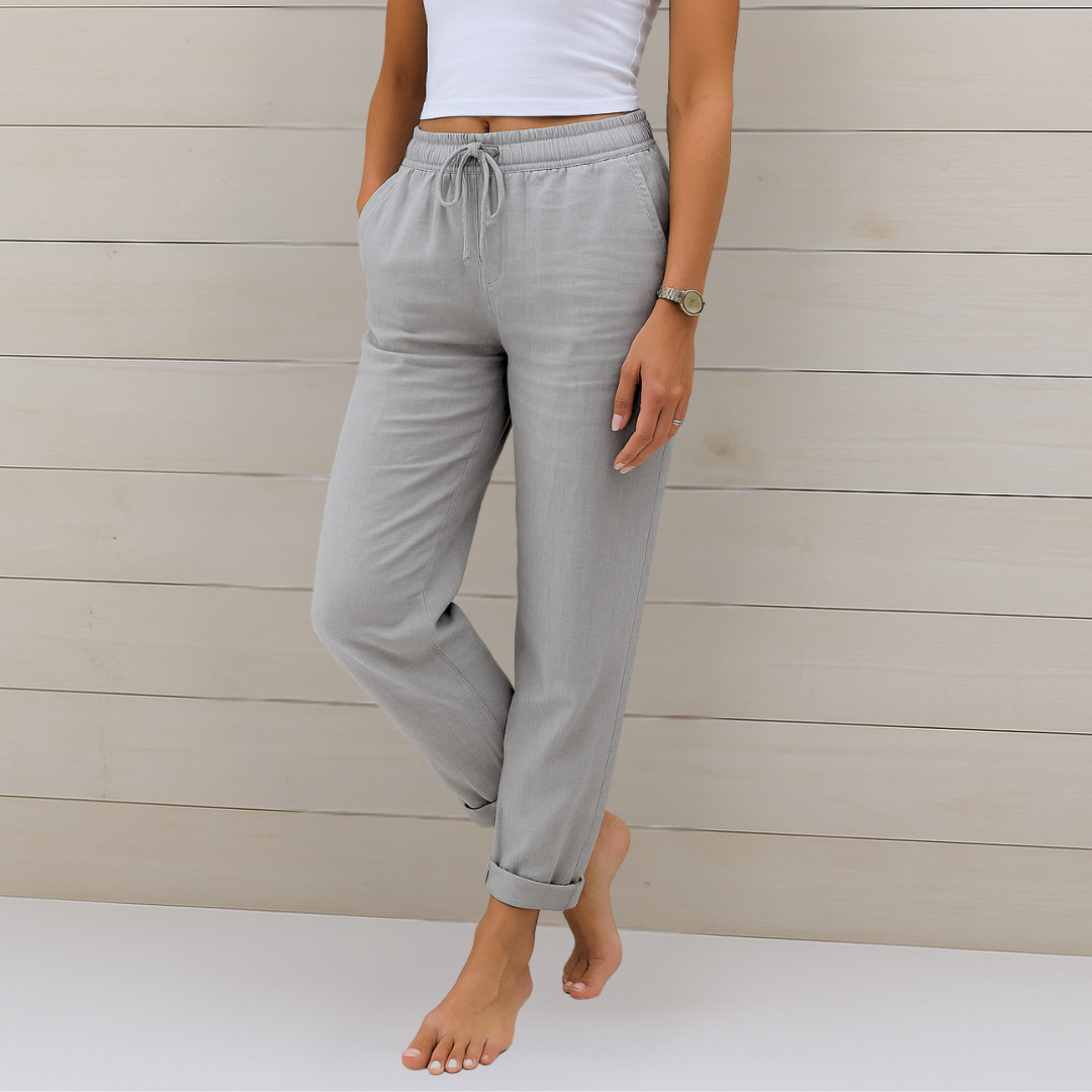 Pantalones casuales grises claros con cintura elástica y cordón, puños en el bajo