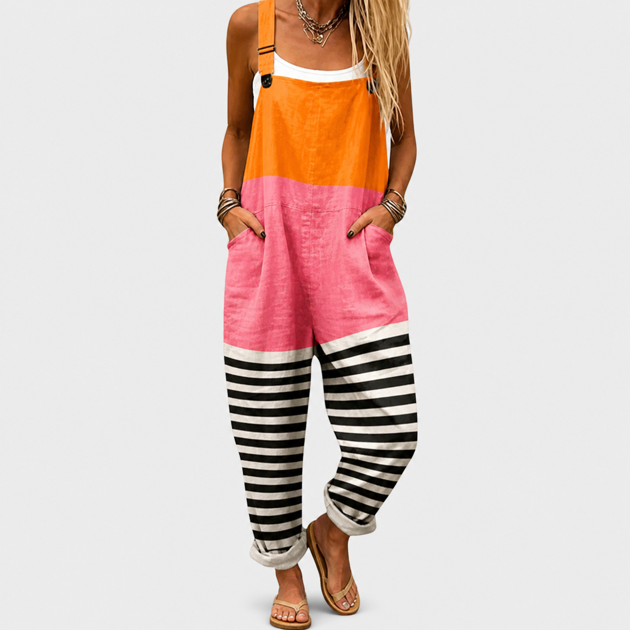Salopette de tirantes bicolor naranja, rosa y rayas negro y blanco