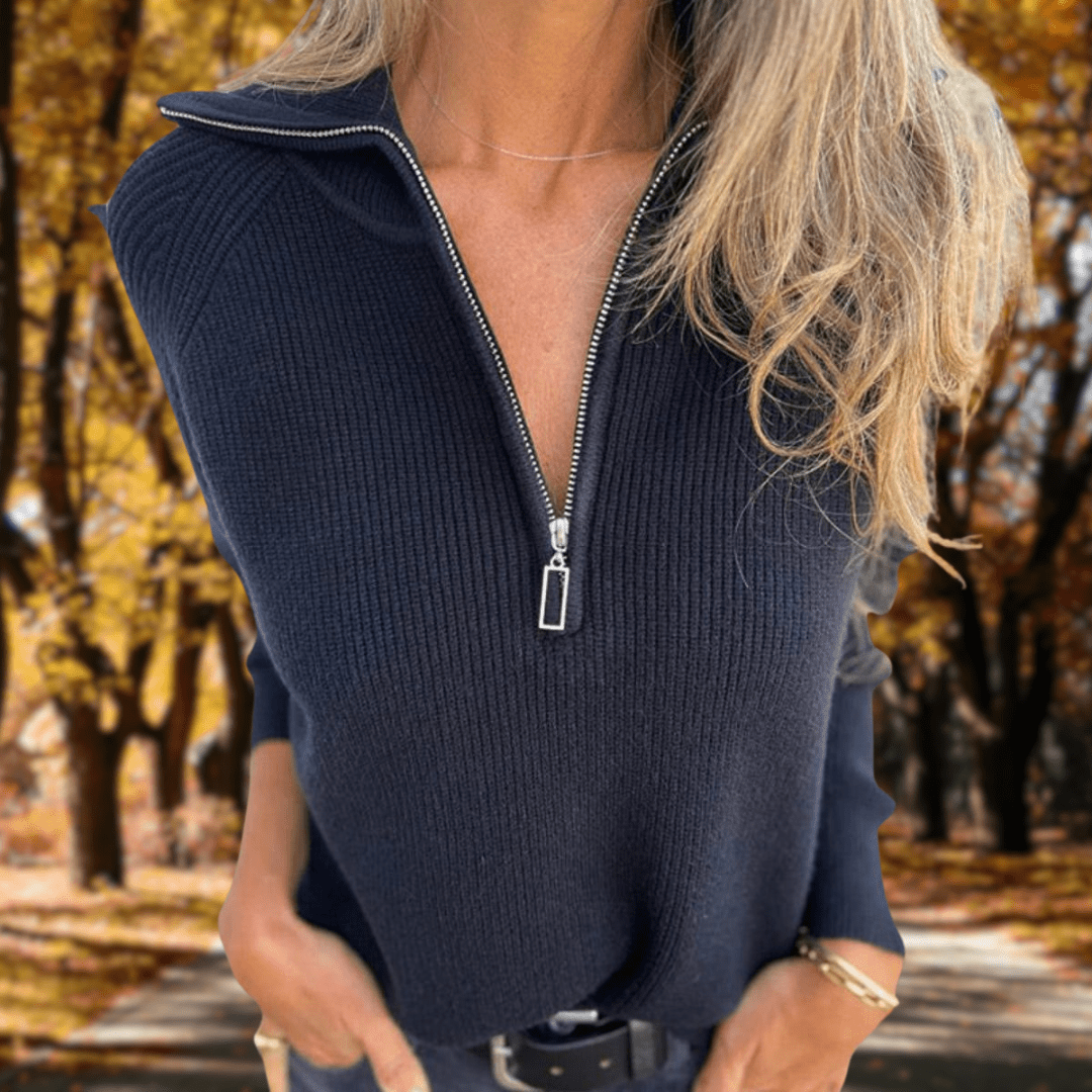 Jersey de punto azul marino con cremallera frontal y cuello alto, manga larga