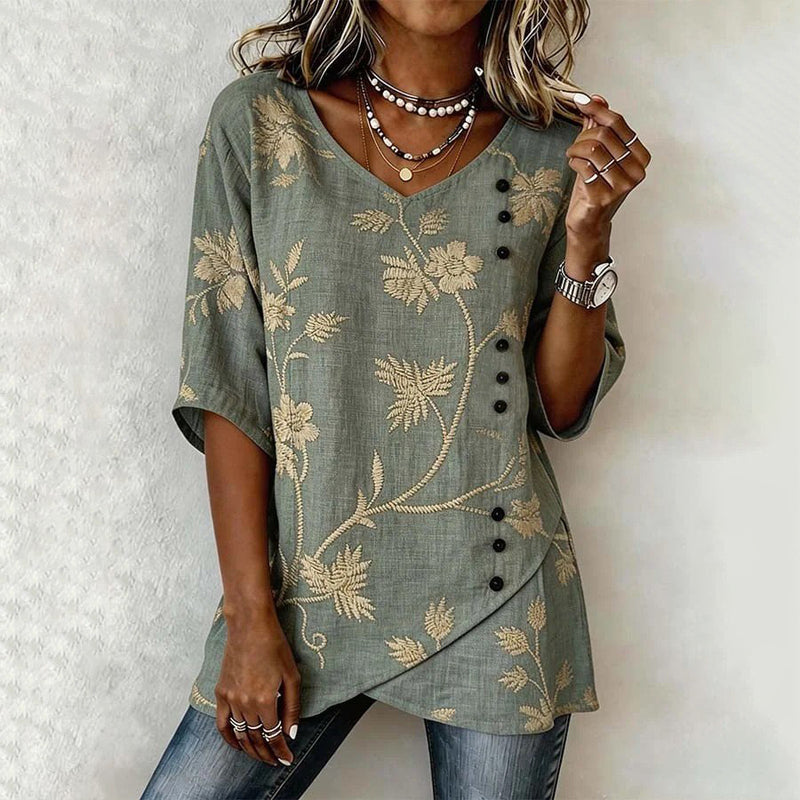 Blusa vintage verde grisácea con estampado floral, cuello en V y cierre de botones
