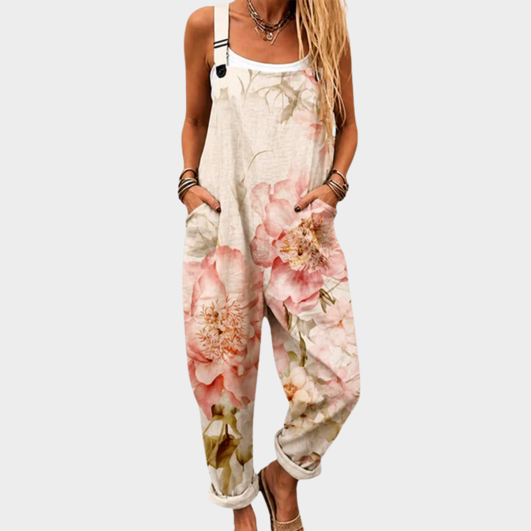 Salopette sin mangas estampada floral rosa con tirantes y pierna ancha