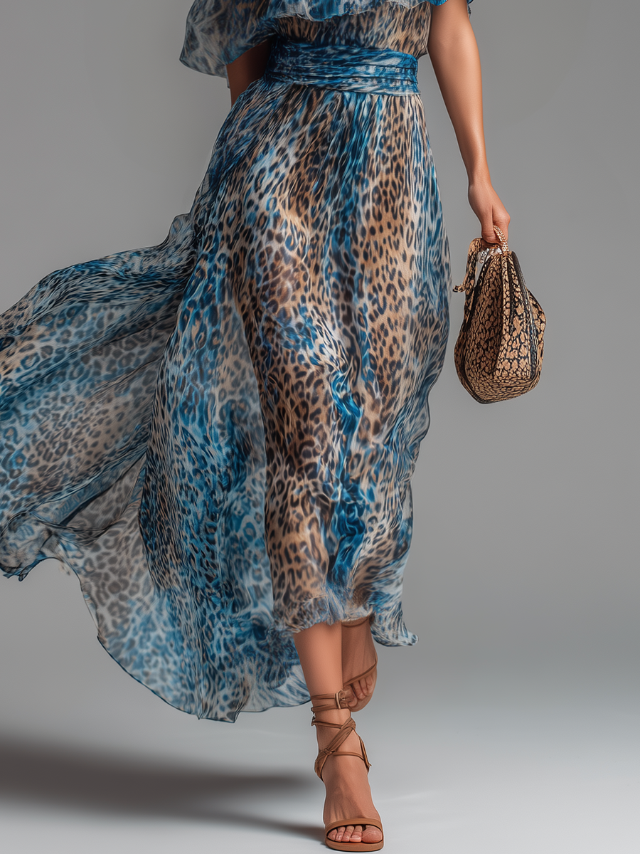 Vestido largo de gasa azul con estampado leopardo, falda amplia y hombros descubiertos