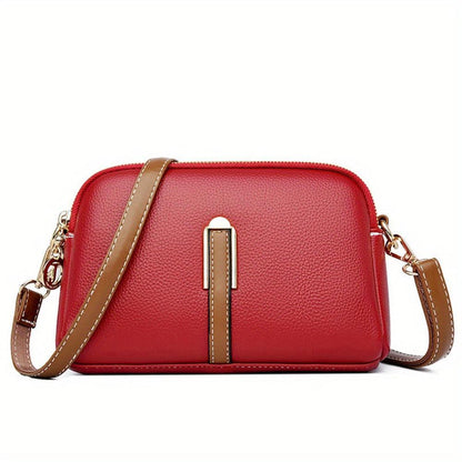 Bolso bandolera textura lichi rojo, cierre cremallera y bandolera con eslabones