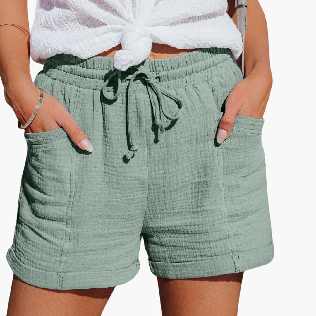 Shorts informales verde con cinturilla elástica y cordón ajustable