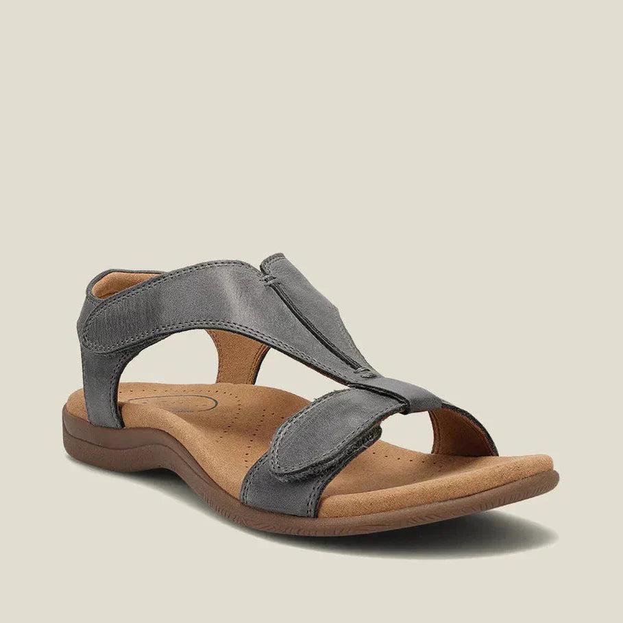 Sandalias ergonómicas grises de ante con velcro y suela con soporte.