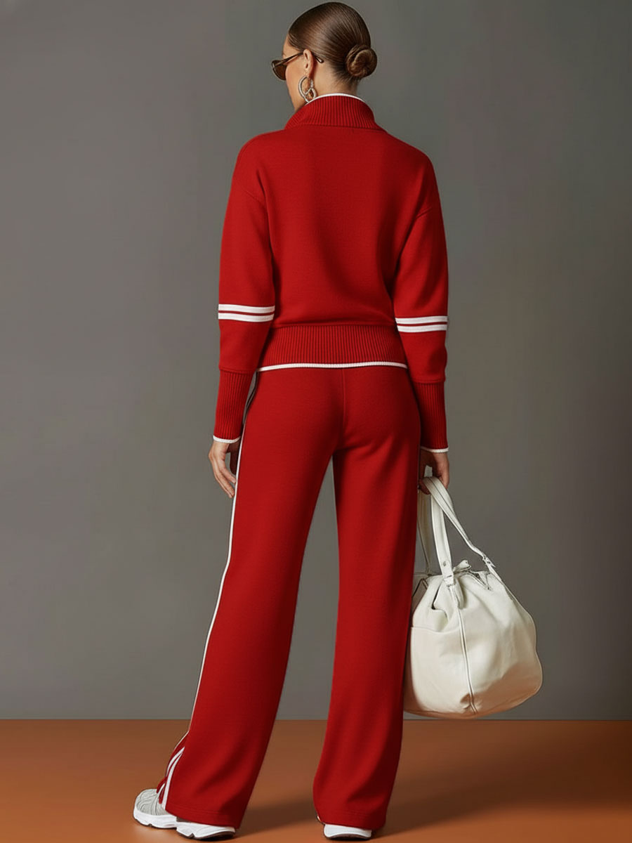 Conjunto deportivo rojo: sudadera de media cremallera y pantalón ancho con rayas blancas