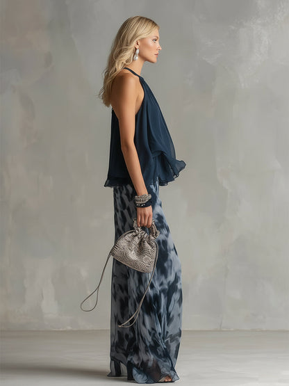 Conjunto azul marino: blusa sin mangas con cuello alto y pantalón estampado