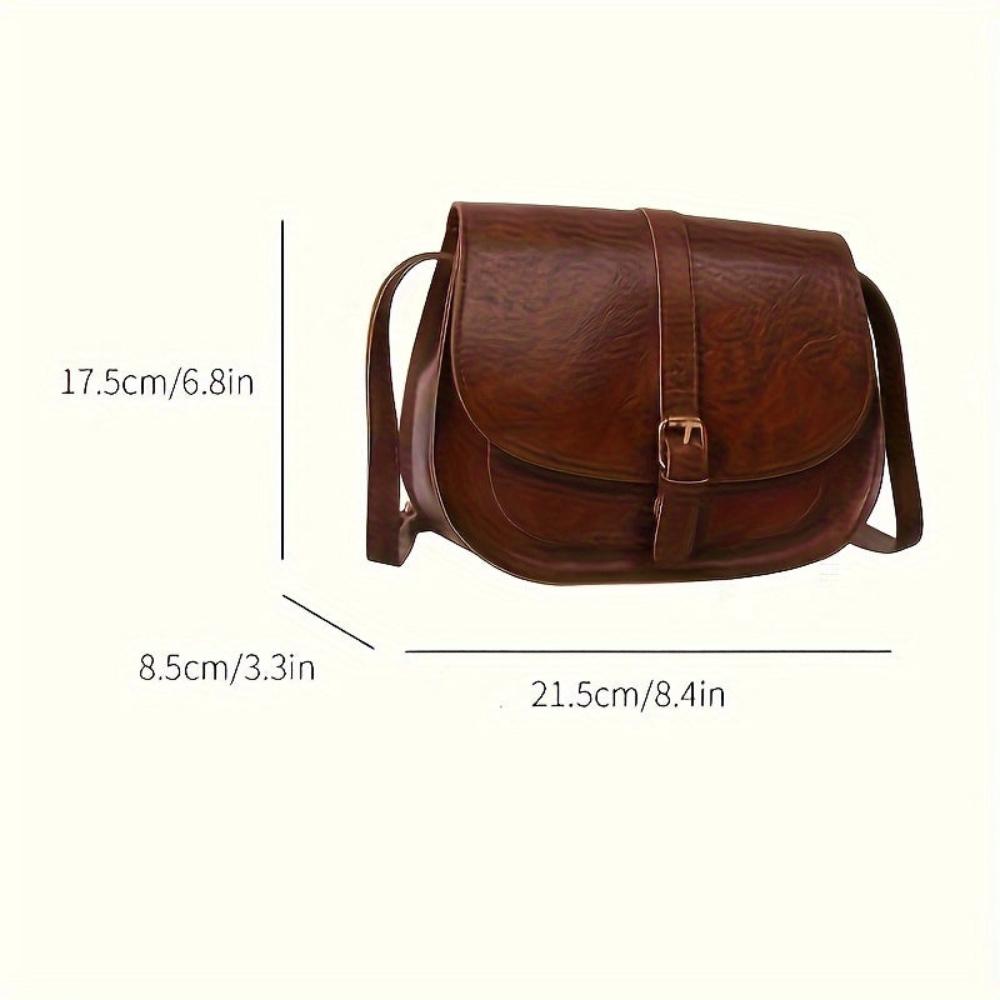 Bolso de hombro clásico marrón oscuro de cuero con solapa y correa cruzada.