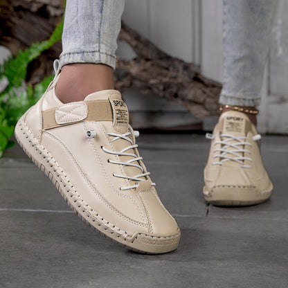 Zapatillas ortopédicas beige con cordones y suela amortiguada, vista lateral.