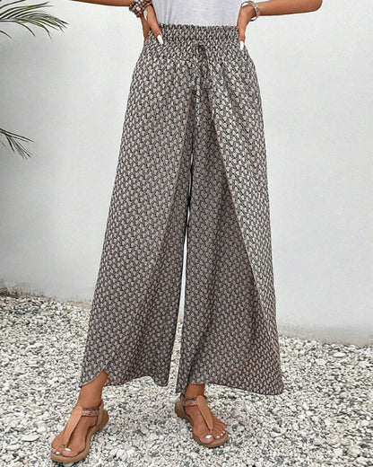 Pantalones de pierna ancha grises con cintura elástica y estampado, tiro largo