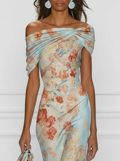 Vestido sirena sin mangas, escote bardot drapeado, estampado floral tonos coral y azul