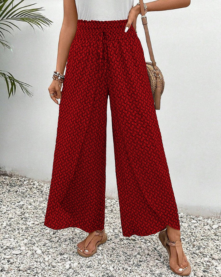 Pantalones de pierna ancha rojos con cintura elástica y estampado texturizado