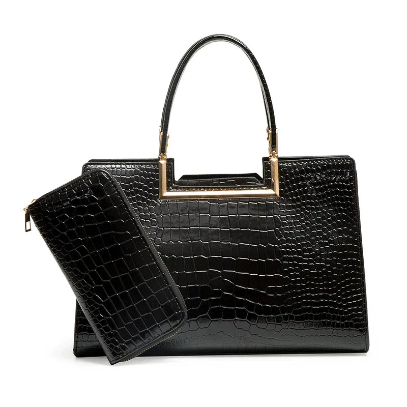 Juego de bolso de cuero negro con cartera a juego, asas superiores y textura tipo cocodrilo