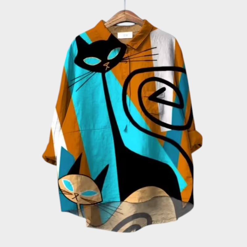 Blusa de lino naranja y turquesa con estampado abstracto de gato negro y botones