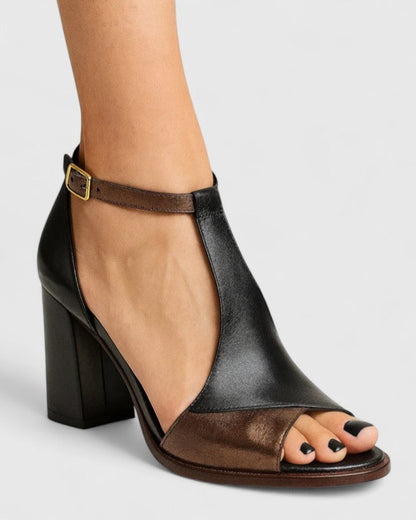 Zapatos de tacón modernos negros con puntera abierta y tira cruzada