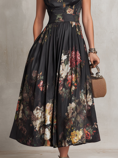 Vestido midi negro con falda plisada y estampado floral en tonos multicolor