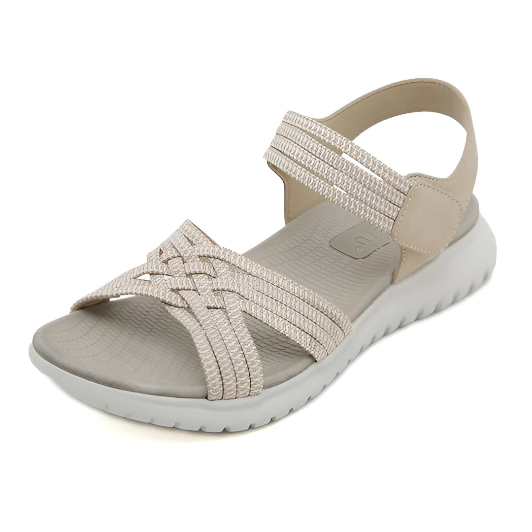 Sandalias ortopédicas beige de una pieza con tira cruzada y suela gruesa acolchada