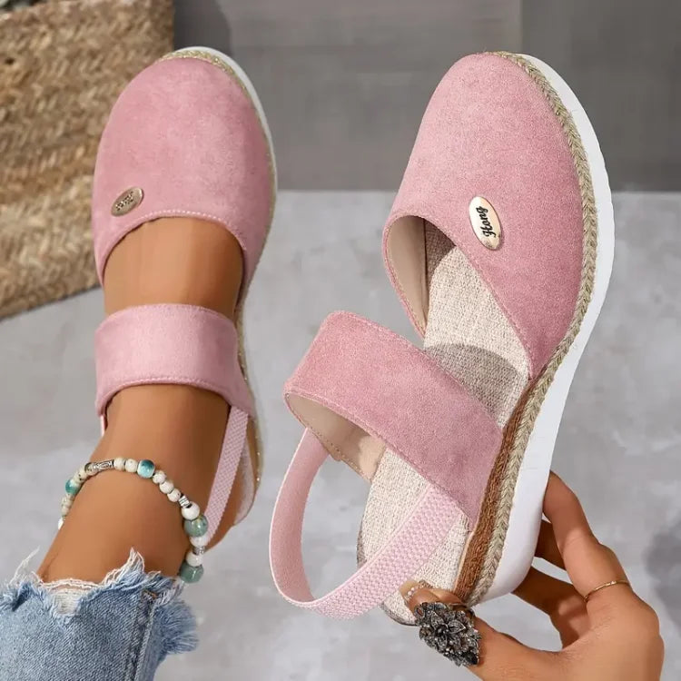 Sandalias rosadas tipo cuña con tiras dobles y suela de yute, acabado gamuzado