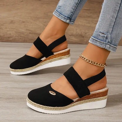 Sandalias negras tipo cuña con doble tira y suela de yute, estilo elegante