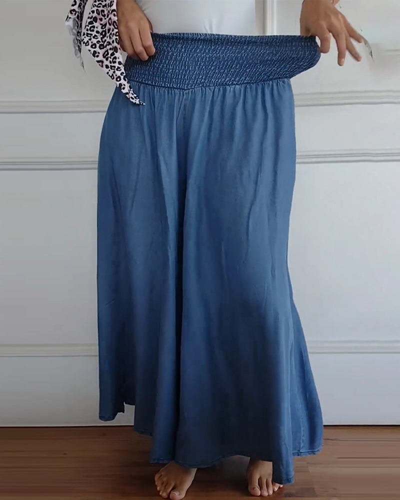 Pantalones de cintura alta con elástico en azul, caída amplia y suelta