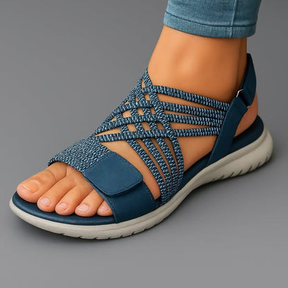 Sandalia ortopédica ergonómica azul con tiras tejidas y banda al empeine