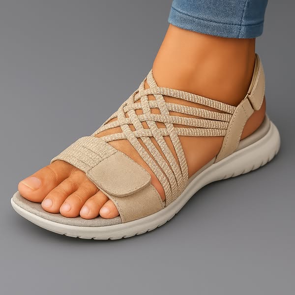 Sandalia ortopédica ergonómica beige con tiras elásticas y banda sobre el empeine