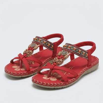 Sandalias ortopédicas estilo Ibiza rojas con tiras cruzadas y bordes con costura
