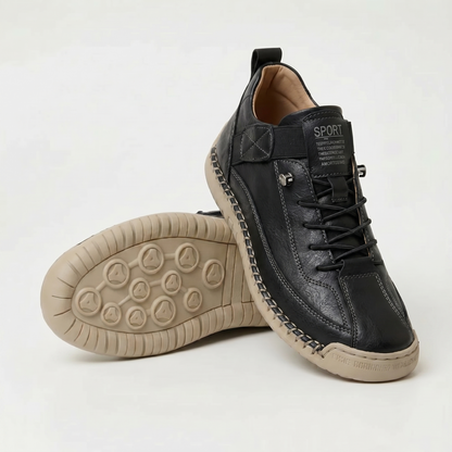 Zapatillas ortopédicas negras con cordones, paneles acolchados y suela beige