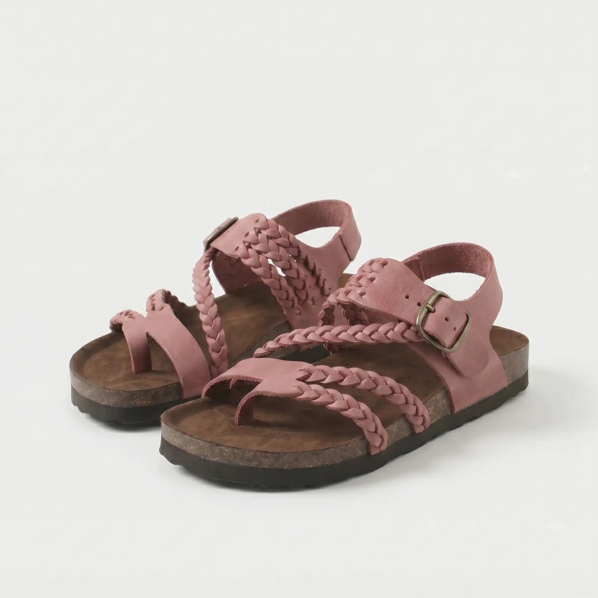 Sandalias ortopédicas rosa oscuro con correas trenzadas y hebilla metálica