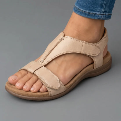 Sandalia ortopédica beige con tira frontal y suela de plataforma
