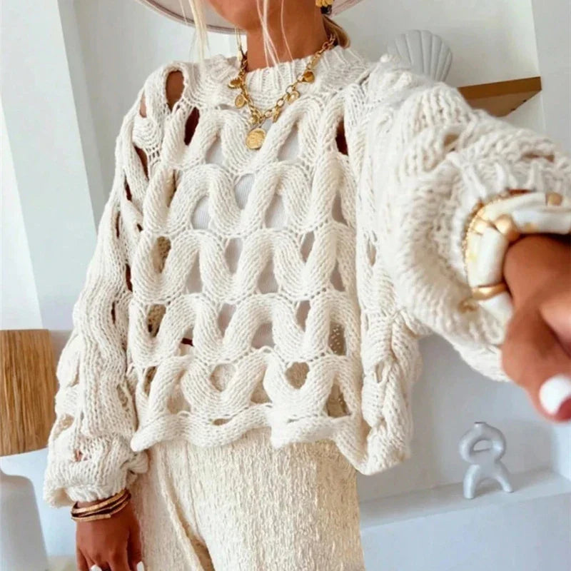 Jersey calado de punto blanco con cuello redondo y mangas largas, calado tipo rejilla