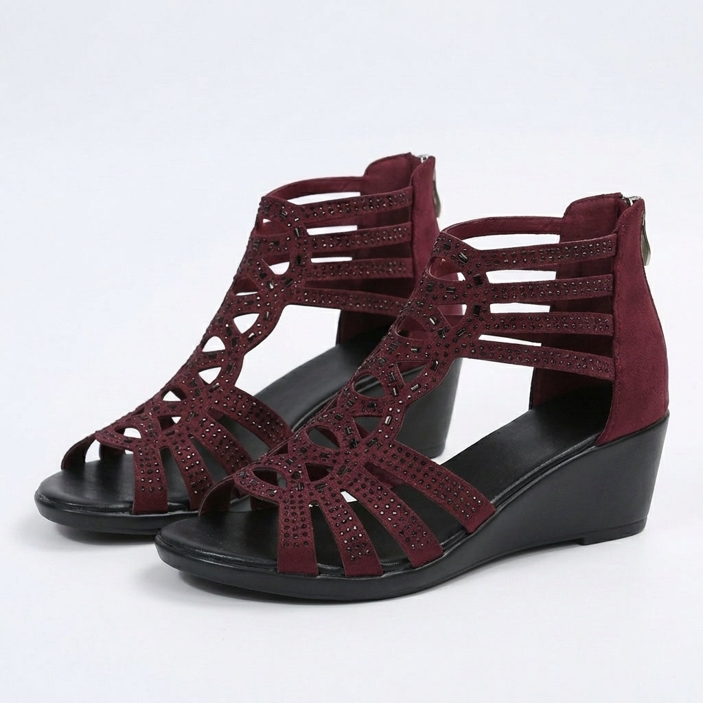 Sandalias ergonómicas GIULIETTA burdeos con tiras caladas y cuña baja