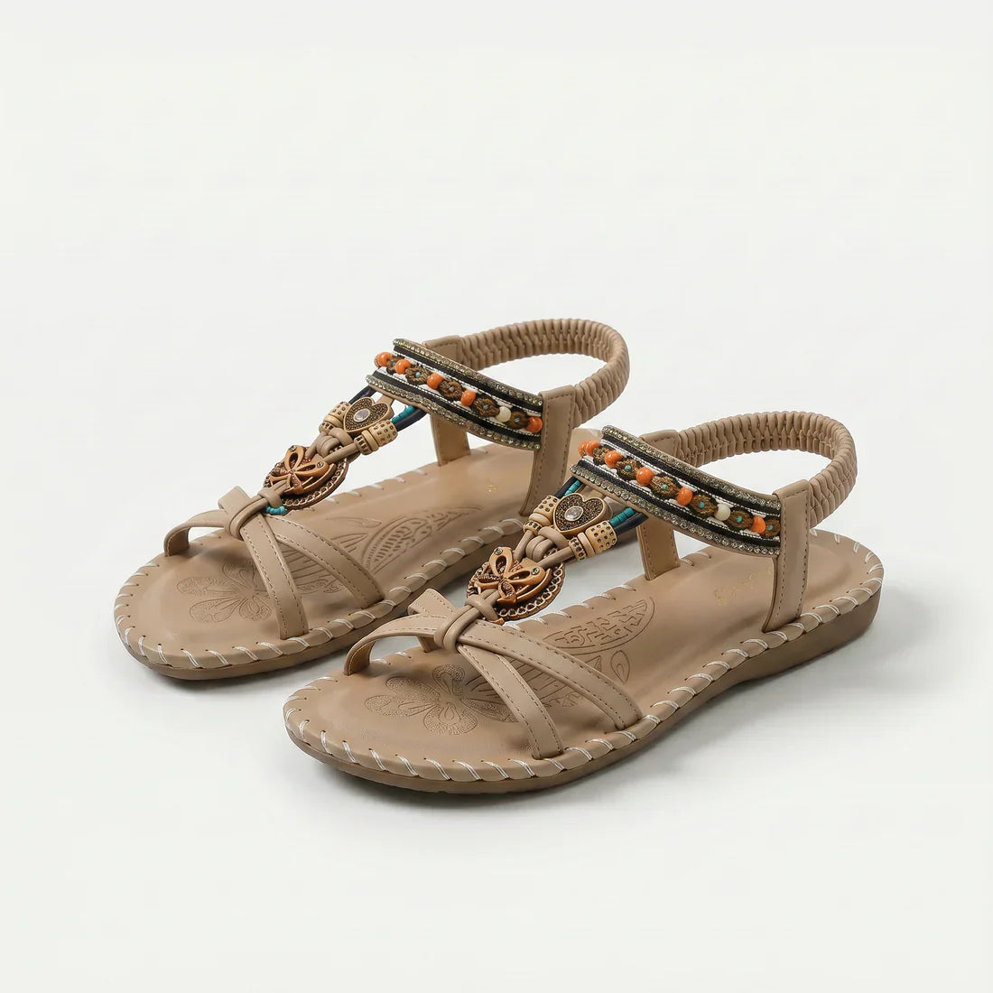Sandalias ortopédicas beige con tiras decoradas, pulsera elástica y suela acolchada