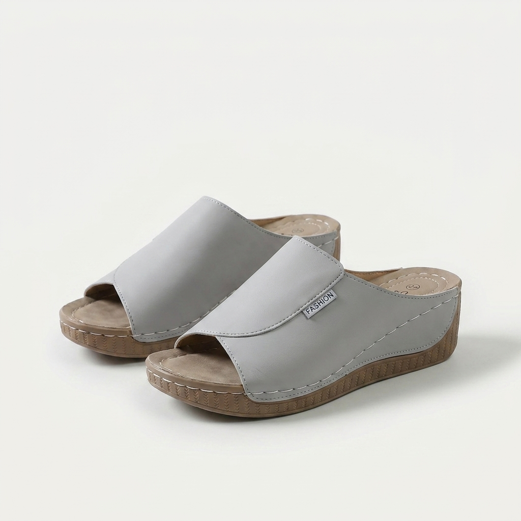 Sandalias tipo zueco con arco plantar, grises claros, suela de cuña de madera
