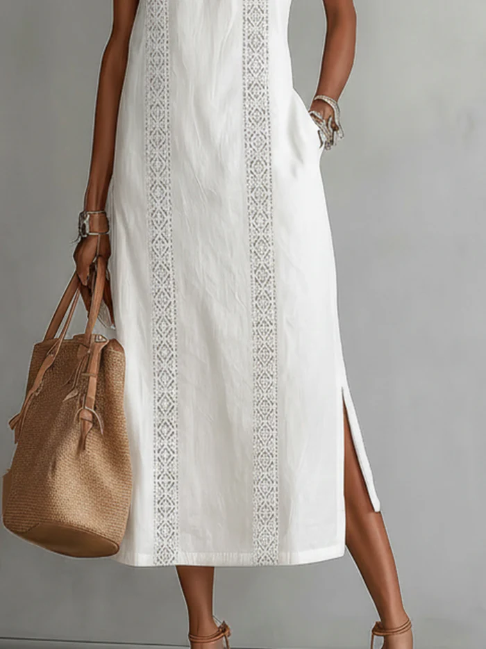 Vestido midi de lino blanco con paneles bordados y abertura lateral
