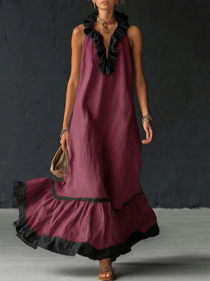 Vestido largo sin mangas burdeos con volantes negros en el escote y dobladillo oscuro