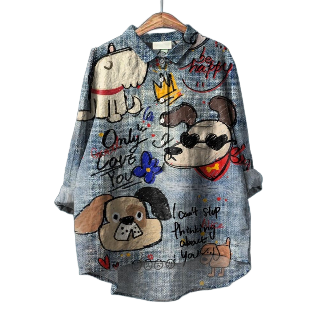 Blusa de lino azul con estampado de dibujos y lazo en el cuello