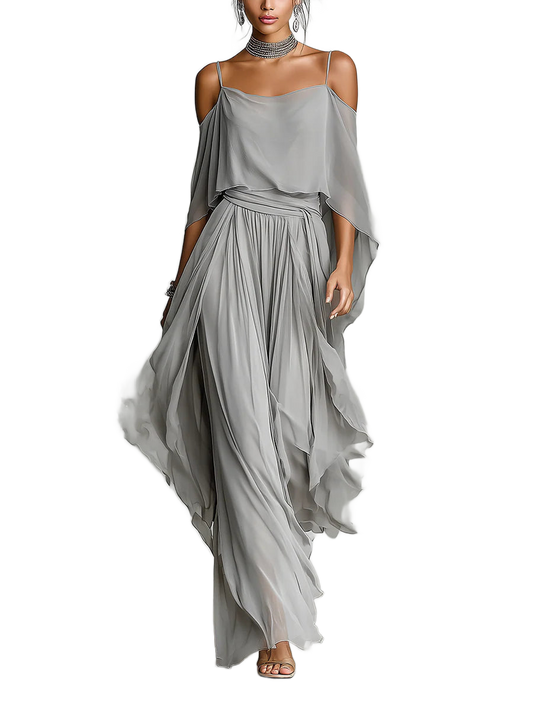 Conjunto gris con top de tirantes y pantalón holgado plisado de caída asimétrica