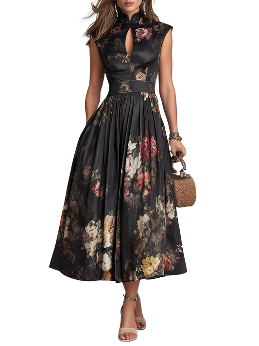Vestido negro midi sin mangas, estampado floral y falda plisada con abertura frontal