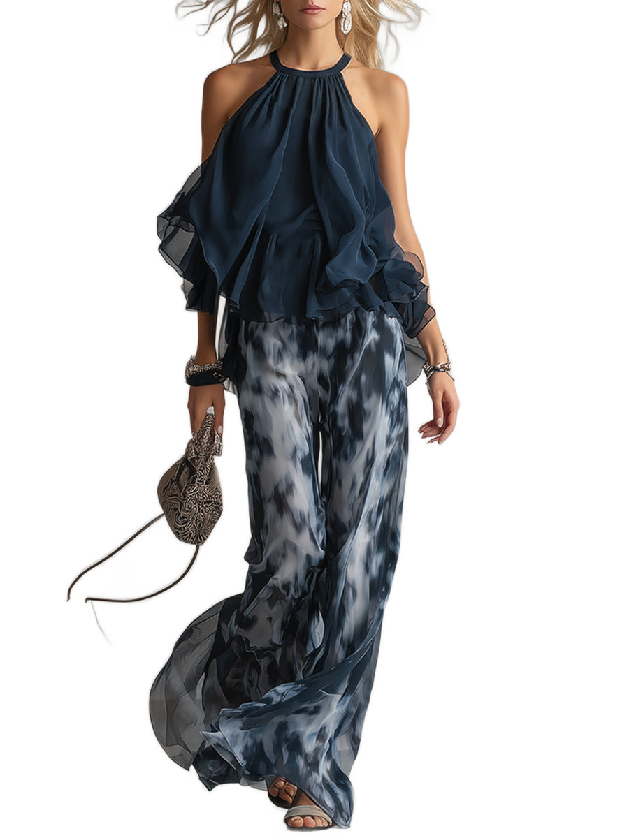 Conjunto elegante en azul marino: blusa con cuello alto y pantalón estampado