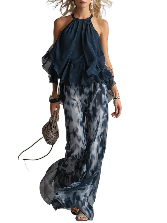 Conjunto elegante en azul marino: blusa con cuello alto y pantalón estampado