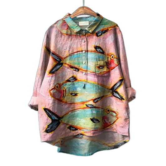 Blusa de lino rosa con estampado de peces multicolor y botones al frente