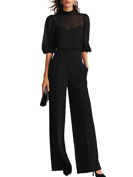 Conjunto negro de tres piezas: blusa de gasa con mangas globo y pantalón palazzo.