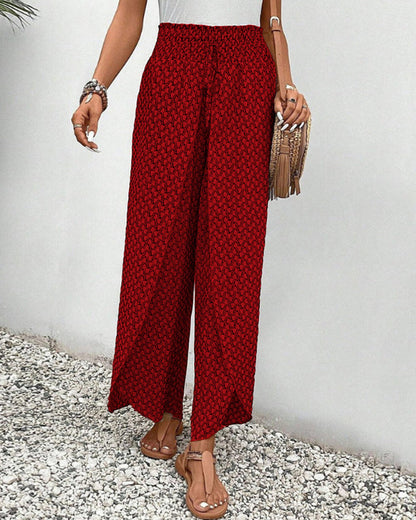 Pantalones de pierna ancha rojos con cintura elástica y estampado repetido